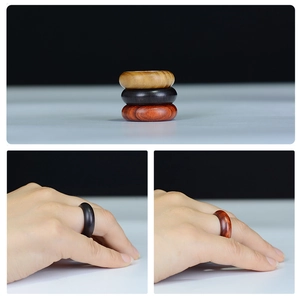 Handcrafted minimalist wooden rings set in natural sandalwood and redwood finishes
