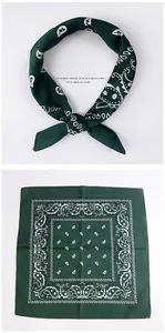 Detail of dark green paisley 100% cotton bandana showing both tied and flat layout