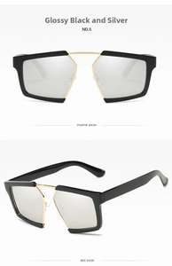 Retro oversized sunglasses with shiny black frames and silver mercury reflective lenses