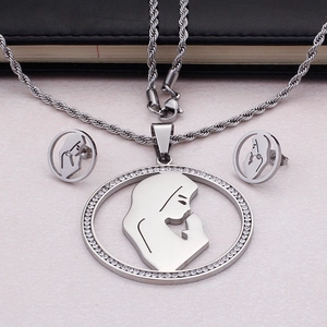 Silver stainless steel jewelry set featuring praying girl silhouette with small crystals