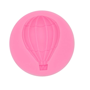 Pink silicone mold with four hot air balloon shapes for DIY cake decorating and baking