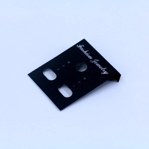 Detail of black matte plastic jewelry display card with Fashion Jewelry print