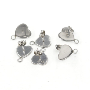 Polished gold-plated heart-shaped earring posts with loops and secure backings