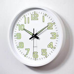 12-inch luminous quartz wall clock with glow-in-the-dark numbers and a white frame