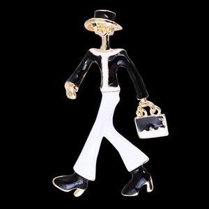 Modern lady brooch in black and white enamel outfit with hat and handbag fashion pin