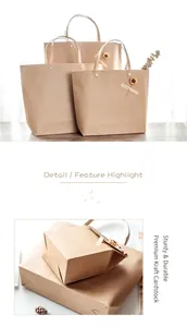 Detail of kraft paper gift bags with metal rivets and sunflower Especially for you stickers