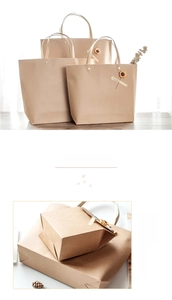 Detail of kraft paper gift bags with metal rivets and sunflower Especially for you stickers