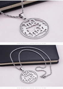 Detail of silver MAMA letter pendant with sparkling crystals and twisted rope chain