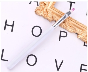 Close-up of flat purple nylon bristle nail art brush with a white handle and silver ferrule