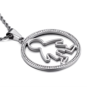 Polished titanium steel necklace featuring a circular pendant with crystals and hollow boy motif