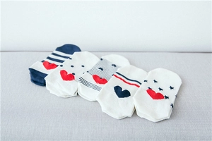 Set of 5 cotton no-show socks featuring stripes, dots, and heart patterns in blue and white