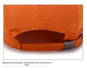 Detail of adjustable metal buckle and mesh fabric on orange quick-dry kids baseball cap