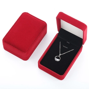 Red velvet necklace jewelry box with black sponge insert showing pendant storage