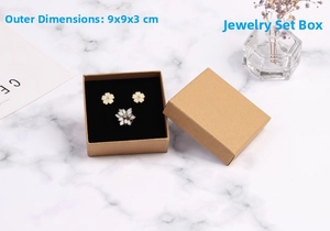 Detail view of 9x9x3cm eco-friendly kraft jewelry gift box with black velvet foam insert