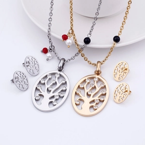 Set of Tree of Life necklaces and earrings in gold and silver finish with small crystals