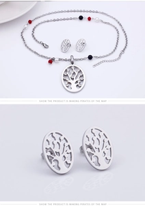 Detail of silver tree of life jewelry set with colorful beads on the chain and earrings
