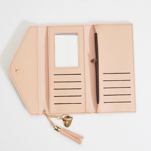 Pink PU leather long wallet for women with heart pendant, tassel and card slots