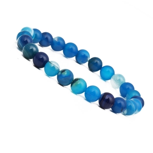 Detail of blue striped agate beaded stretch bracelet showing high polished round stone texture