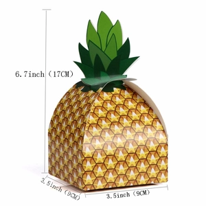 Detailed dimensions of yellow pineapple-shaped paper candy gift box with green leaves
