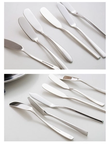 Detail of 18/10 stainless steel butter knife with Cosmopolitan engraving on handle
