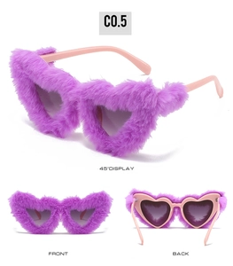 Three angles of plush heart-shaped sunglasses with purple faux fur and pink frames