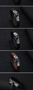 Detail of classic leather bracelets with silver metal snake head clasps and woven textures