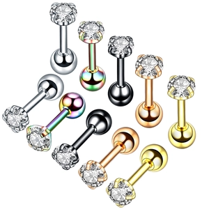 Macro detail of round cubic zirconia studs in five metallic colors and four-prong setting