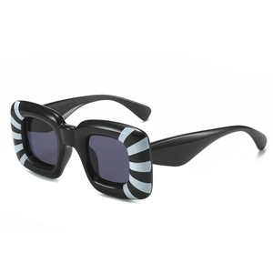 Y2K square oversized sunglasses featuring black frames with stylish zebra pattern details