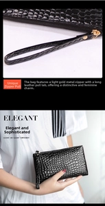Detail of black crocodile texture clutch bag with gold zipper and leather wristlet strap