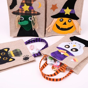 Set of 4 Halloween linen candy bags with witch pumpkin black cat and skull designs