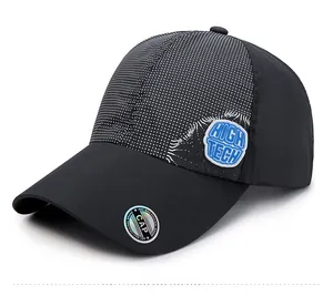Detail of outdoor baseball cap showing high-tech rubber badge and white micro-dot texture