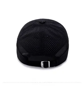 Detail view of the breathable mesh back and adjustable silver metal buckle on black baseball cap