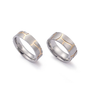 Fashionable titanium steel couple rings with silver brushed finish and gold geometric lines