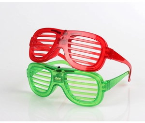 Detail view of red and green LED shutter glasses with visible battery compartments