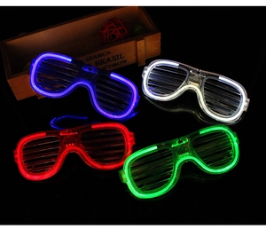 Glow-in-the-dark LED shutter glasses in blue, white, red, and green for party events