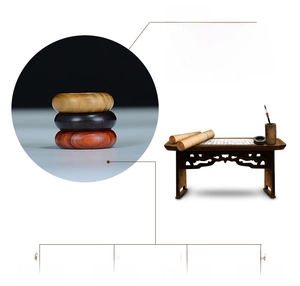 Detail of three types of polished rosewood rings showing natural wood grain and textures
