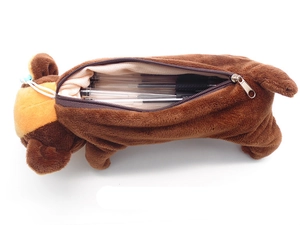 Detail view of plush dog pencil case with zipper open showing inner stationery storage