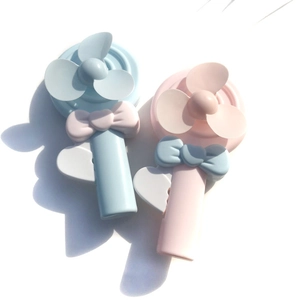 Lollipop style handheld fans in pink and blue featuring cute bows and heart-shaped base