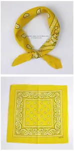 Detail of yellow cotton neckerchief showing paisley pattern and soft fabric texture