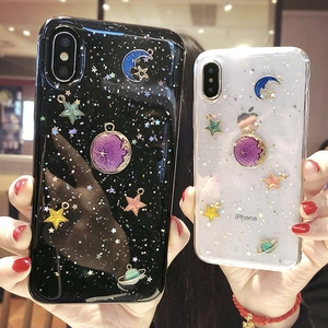 Detail of star and planet theme phone cases with glitter effect and ring stand
