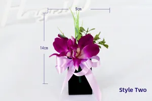 Style 2 artificial purple orchid corsage with silk ribbon bow measuring 14cm by 9cm