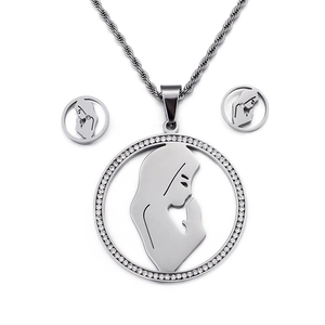 Silver stainless steel jewelry set with crystal circular prayer figure necklace and earrings
