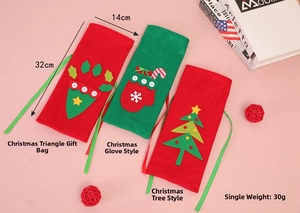 Detail of Christmas felt wine bags in tree and glove designs with 32x14cm dimensions