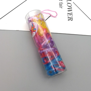 Colorful elastic hair bands for kids in a transparent storage tube with pink handle