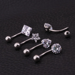 Five stainless steel belly rings with heart, star, square, and round zircon stones