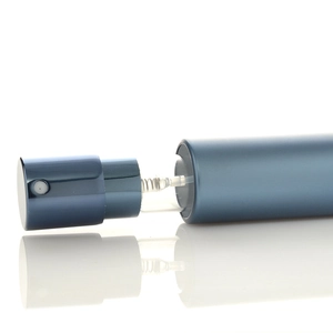Close-up of blue 10ml refillable spray bottle with matte finish and clear straw tube