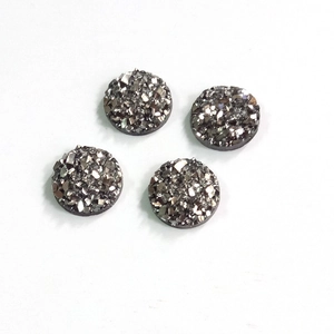 Detailed view of 8mm silver resin sparkling crystals with druzy texture and flat back