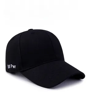 Detail of white Grl Pwr letter embroidery on black cotton baseball cap side panel