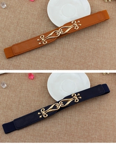 Detail of elastic waist belts in brown and navy with artistic gold metal buckles