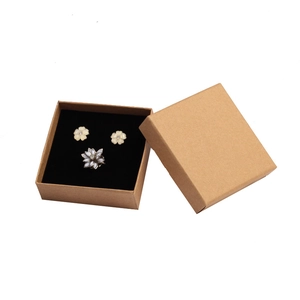 Vintage kraft paper jewelry gift box set with white floral earrings and ring inside